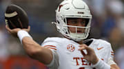 Texas Longhorns quarterback Arch Manning warms up before an NCAA football game against Florida in Gainesville, FL.