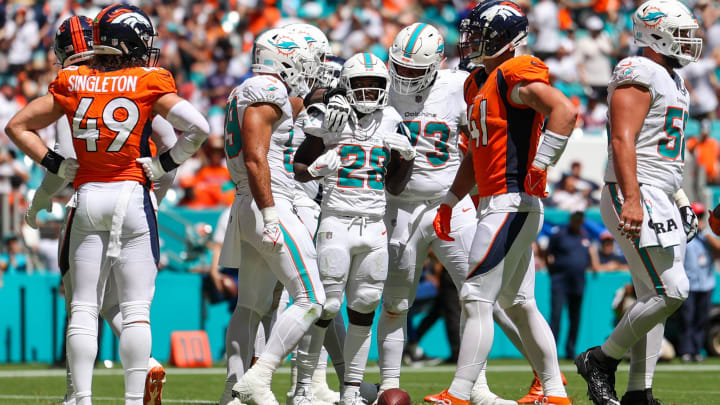 Miami Dolphins running back De'Von Achane (28) celebrates after scoring a touchdown against the Denver Broncos in the second quarter at Hard Rock Stadium last season.