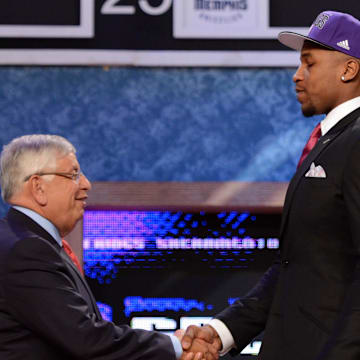 June 28, 2012; Newark, NJ, USA; Thomas Robinson (Kansas), right, is introduced as the number five overall pick to the Sacramento Kings by NBA commissioner David Stern during the 2012 NBA Draft at the Prudential Center.  Mandatory Credit: Jerry Lai-Imagn Images