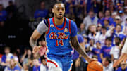 Mar 8, 2025; Gainesville, Florida, USA; Mississippi Rebels guard Dre Davis (14) dribbles the ball against the Florida Gators during the first half at Exactech Arena at the Stephen C. O'Connell Center. Mandatory Credit: Matt Pendleton-Imagn Images
