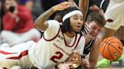 Arkansas Razorbacks guard Boogie Fland (2) reaches for the ball after knocking it away from UCA Bears guard Layne Taylor (32) during the second half at Simmons Bank Arena.