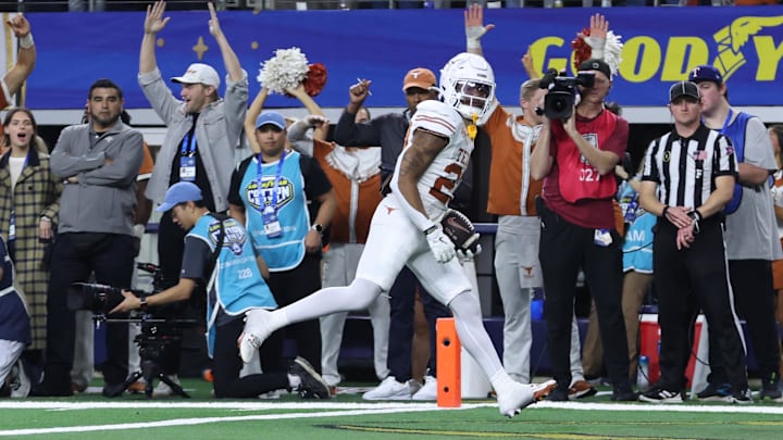 Texas Longhorns running back Jaydon Blue scores a touchdown against the Ohio State Buckeyes.