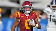 Sep 6, 2025; Los Angeles, California, USA;  USC Trojans wide receiver Makai Lemon (6) runs down field for a touchdown on a pass play during the first half against the Georgia Southern Eagles at the Los Angeles Memorial Coliseum. Mandatory Credit: Jayne Kamin-Oncea-Imagn Images