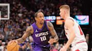 Mar 20, 2025; Sacramento, California, USA; Sacramento Kings forward DeMar DeRozan (10) controls the ball against Chicago Bulls guard Kevin Huerter (13) during the second quarter at Golden 1 Center. Mandatory Credit: Ed Szczepanski-Imagn Images