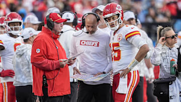 Nov 24, 2024; Charlotte, North Carolina, USA;  Kansas City Chiefs head coach Andy Reid talks with quarterback Patrick Mahomes (15) during a time out during the second half against the Carolina Panthers at Bank of America Stadium. Mandatory Credit: Jim Dedmon-Imagn Images