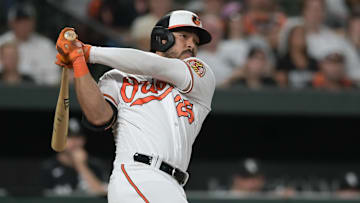 Aug 28, 2023; Baltimore, Maryland, USA; Baltimore Orioles right fielder Anthony Santander (25) swings through a three run home run in the eighth inning against the Chicago White Sox  at Oriole Park at Camden Yards.