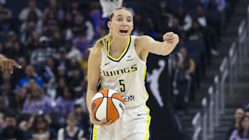 Jul 25, 2025; San Francisco, California, USA;  Dallas Wings guard Paige Bueckers (5) gestures against the Golden State Valkyries during the first quarter at Chase Center. Mandatory Credit: John Hefti-Imagn Images