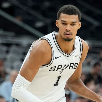 Oct 6, 2025; San Antonio, TX, USA; San Antonio Spurs forward-center Victor Wembanyama (1) drives to the basket during the first half against the Guangzhou Loong Lions at Frost Bank Center. Mandatory Credit: Scott Wachter-Imagn Images