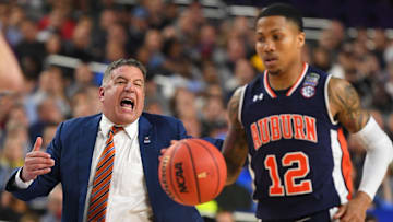 Auburn Tigers head coach Bruce Pearl yells from the sideline to guard J'Von McCormick (12)