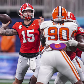 Aug 31, 2024; Atlanta, Georgia, USA; Georgia Bulldogs quarterback Carson Beck (15) passes the ball against the Clemson Tigers during the second half at Mercedes-Benz Stadium. Mandatory Credit: Dale Zanine-Imagn Images