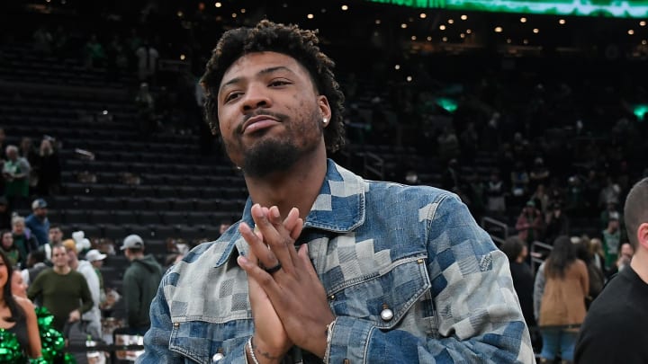 Feb 4, 2024; Boston, Massachusetts, USA; Memphis Grizzlies guard Marcus Smart (36) gestures to fans after a game against the Boston Celtics at TD Garden. 