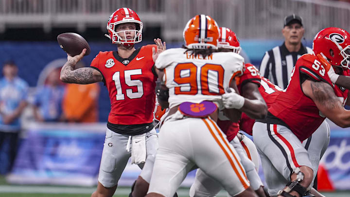 Aug 31, 2024; Atlanta, Georgia, USA; Georgia Bulldogs quarterback Carson Beck (15) passes the ball against the Clemson Tigers during the second half at Mercedes-Benz Stadium. Mandatory Credit: Dale Zanine-Imagn Images