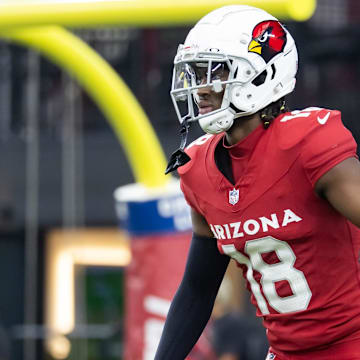 Aug 10, 2024; Glendale, Arizona, USA; Arizona Cardinals wide receiver Marvin Harrison Jr. (18) against the New Orleans Saints during a preseason NFL game at State Farm Stadium. Mandatory Credit: Mark J. Rebilas-Imagn Images
