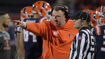 Oct 6, 2023; Champaign, Illinois, USA; Illinois Fighting Illini head coach Bret Bielema talks with an official during the first half against the Nebraska Cornhuskers at Memorial Stadium. Mandatory Credit: Ron Johnson-USA TODAY Sports
