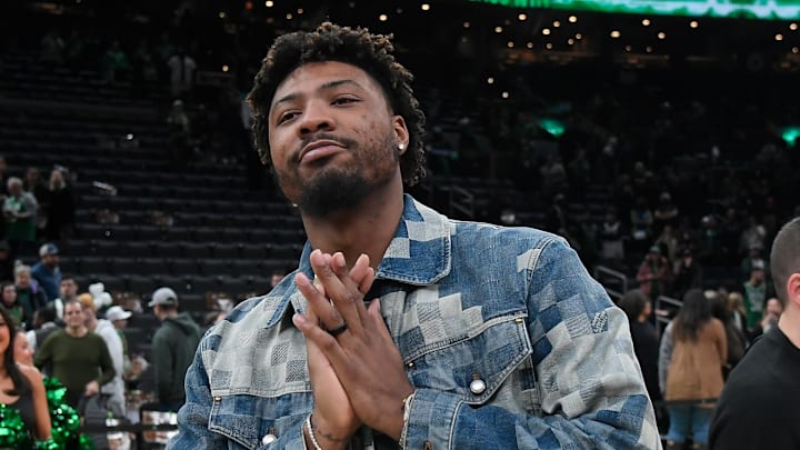 Feb 4, 2024; Boston, Massachusetts, USA; Memphis Grizzlies guard Marcus Smart (36) gestures to fans after a game against the Boston Celtics at TD Garden. Mandatory Credit: Eric Canha-Imagn Images
