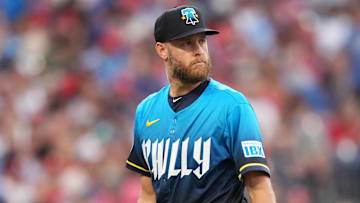 Jun 20, 2025; Philadelphia, Pennsylvania, USA; Philadelphia Phillies starting pitcher Zack Wheeler (45) looks on against the New York Mets in the second inning at Citizens Bank Park