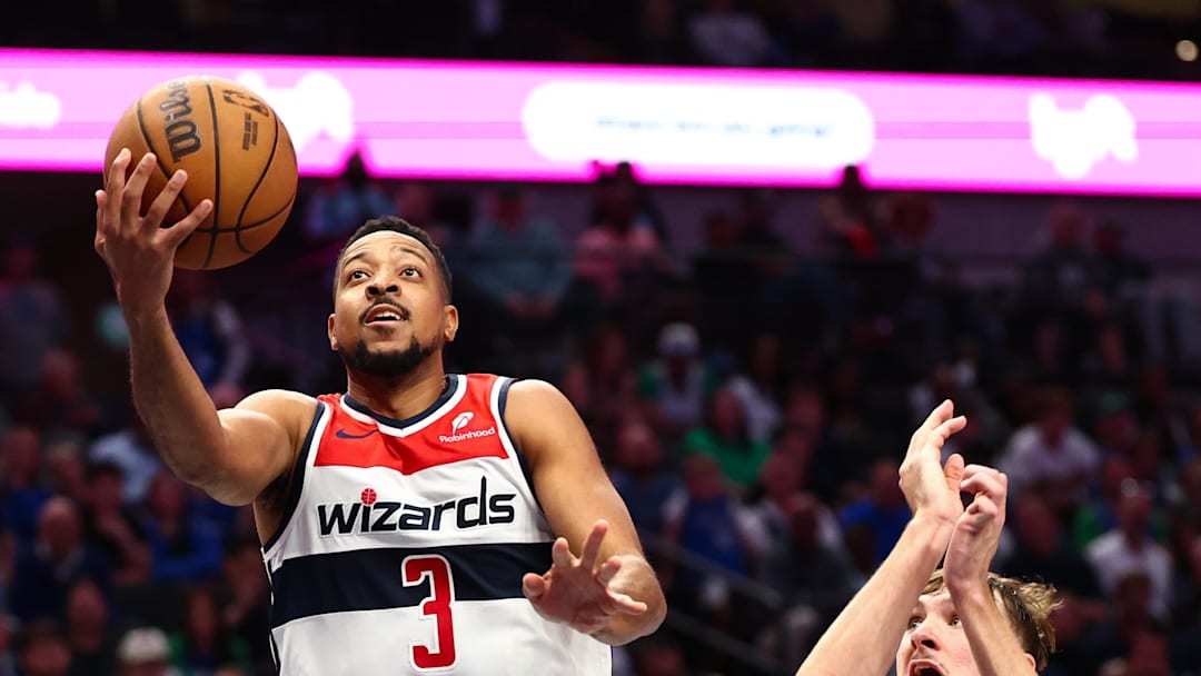 Oct 24, 2025; Dallas, Texas, USA; Washington Wizards guard CJ McCollum (3) shoots past Dallas Mavericks forward Cooper Flagg (32) during the second half at American Airlines Center. Mandatory Credit: Kevin Jairaj-Imagn Images Oct 24, 2025; Dallas, Texas, USA; Washington Wizards guard CJ McCollum (3) shoots past Dallas Mavericks forward Cooper Flagg (32) during the second half at American Airlines Center. Mandatory Credit: Kevin Jairaj-Imagn Images