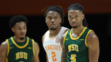 Dec 31, 2024; Knoxville, Tennessee, USA; Tennessee Volunteers guard Chaz Lanier (2) and Norfolk State Spartans guard Brian Moore Jr. (5) during the second half at Thompson-Boling Arena at Food City Center. Mandatory Credit: Randy Sartin-Imagn Images