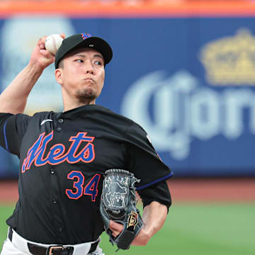 Jul 26, 2024; New York City, New York, USA; New York Mets starting pitcher Kodai Senga (34) delivers a pitch during the second inning against the Atlanta Braves at Citi Field. Mandatory Credit: Vincent Carchietta-USA TODAY Sports