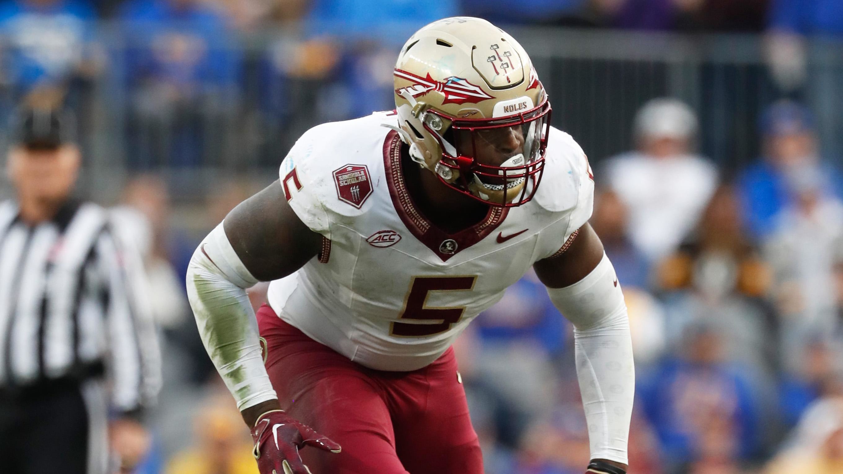 Florida State Seminoles defensive lineman Jared Verse lines up before a snap.