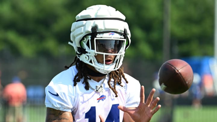 Buffalo Bills wide receiver Chase Claypool (14) catches a pass during training camp at St. John Fisher University.