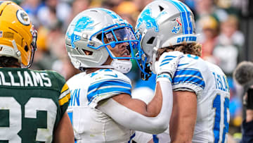Detroit Lions wide receiver Isaac TeSlaa (18) celebrates his touchdown against the Green Bay Packers with wide receiver Amon-Ra St. Brown (14) during the second half at Lambeau Field in Green Bay, Wisconsin, on Sunday, September 7, 2025.