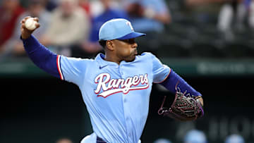 Apr 6, 2025; Arlington, Texas, USA; Texas Rangers pitcher Kumar Rocker (80) throws a pitch during the first inning against the Tampa Bay Rays at Globe Life Field. 