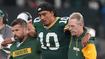 Sep 6, 2024; Sao Paulo, BRA; Green Bay Packers quarterback Jordan Love (10) is assisted off the field after an injury during the second half against the Philadelphia Eagles at Neo Quimica Arena. Mandatory Credit: Kirby Lee-Imagn Images