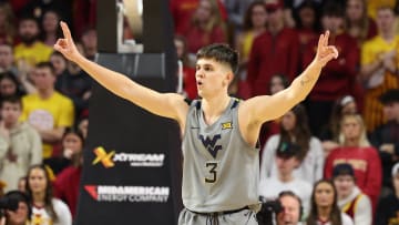 Feb 24, 2024; Ames, Iowa, USA; West Virginia Mountaineers guard Kerr Kriisa (3) celebrates after a basket against the Iowa State Cyclones during the second half at James H. Hilton Coliseum. Mandatory Credit: Reese Strickland-USA TODAY Sports