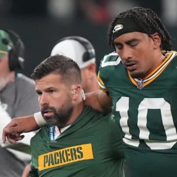 Sep 6, 2024; Sao Paulo, BRA; Green Bay Packers quarterback Jordan Love (10) is assisted off the field after an injury during the second half against the Philadelphia Eagles at Neo Quimica Arena. Mandatory Credit: Kirby Lee-Imagn Images