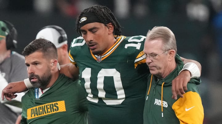 Sep 6, 2024; Sao Paulo, BRA; Green Bay Packers quarterback Jordan Love (10) is assisted off the field after an injury during the second half against the Philadelphia Eagles at Neo Quimica Arena. Mandatory Credit: Kirby Lee-Imagn Images