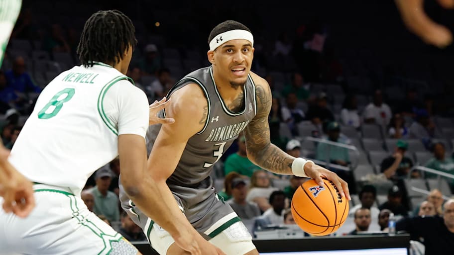 Yaxel Lendeborg dribbles the basketball during a game for UAB last season.
