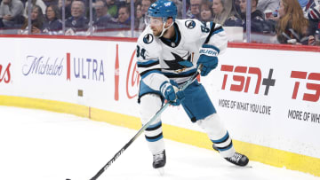 Feb 14, 2024; Winnipeg, Manitoba, CAN; San Jose Sharks Alexander Barabanov (94) skates with the puck