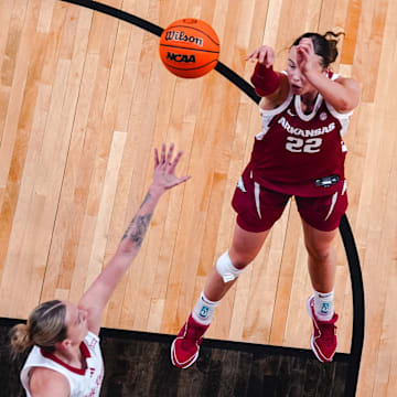 Arkansas freshman Bonnie Deas puts up a field goal attempt in Sunday's game against Texas Tech in Lubbock, Texas.