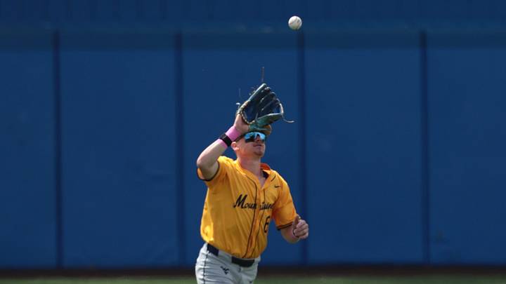 West Virginia Mountaineers fifth year senior Paul Schoenfeld (6) makes an out against Kansas Jayhawks during the game inside Hoglund Ballpark on May 10, 2026.