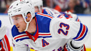 Nov 23, 2024; Edmonton, Alberta, CAN; New York Rangers defensemen Adam Fox (23) waits for the play to begin against the Edmonton Oilers at Rogers Place. Mandatory Credit: Perry Nelson-Imagn Images