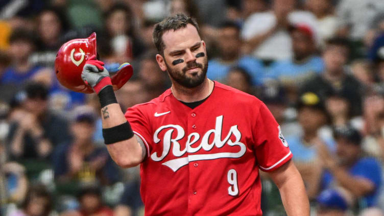 Cincinnati Reds first baseman Mike Moustakas (9) reacts.