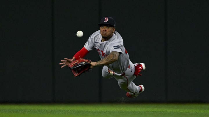 Aug 3, 2024; Arlington, Texas, USA;  Boston Red Sox center fielder Ceddanne Rafaela (43) dives but cannot catch a ball hit by Texas Rangers left fielder Ezequiel Duran (not pictured) during the fourth inning at Globe Life Field.