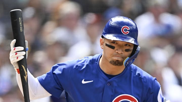 Chicago Cubs right fielder Seiya Suzuki (27) throws his bat after hitting a fly ball during the sixth inning against the San Diego Padres