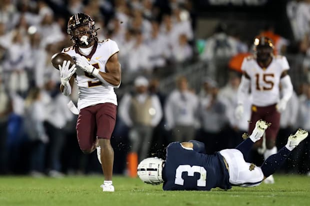 Minnesota Golden Gophers defensive back Justin Walley (5) intercepts the ball.
