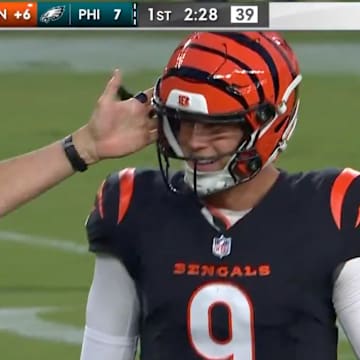 Joe Burrow got a pat on the helmet from referee Bill Vinovich after throwing a preseason touchdown pass. 