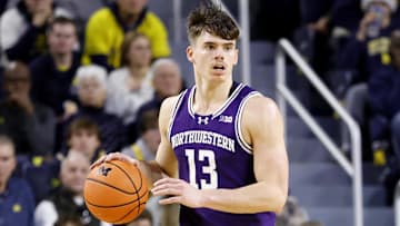 Jan 19, 2025; Ann Arbor, Michigan, USA;  Northwestern Wildcats guard Brooks Barnhizer (13) dribbles in the second half against the Michigan Wolverines at Crisler Center. Mandatory Credit: Rick Osentoski-Imagn Images