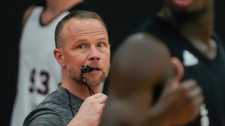 Louisville coach Pat Kelsey instructs his team during practice before the Cards head to the Bahamas. July 26, 2024