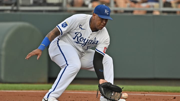 Jul 27, 2024; Kansas City, Missouri, USA; Kansas City Royals first baseman Salvador Perez (13) fields a ground ball in the first inning against the Chicago Cubs at Kauffman Stadium.