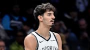 Nov 3, 2025; Brooklyn, New York, USA; Brooklyn Nets guard Ben Saraf (77) during a game against the Minnesota Timberwolves at Barclays Center. Mandatory Credit: John Jones-Imagn Images