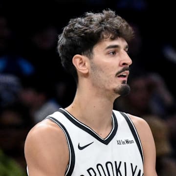 Nov 3, 2025; Brooklyn, New York, USA; Brooklyn Nets guard Ben Saraf (77) during a game against the Minnesota Timberwolves at Barclays Center. Mandatory Credit: John Jones-Imagn Images