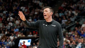 Head coach Bucky McMillan of the Samford Bulldogs reacts during the first half against the Kansas Jayhawks in the first round of the NCAA Men's Basketball Tournament at Delta Center on March 21, 2024 in Salt Lake City, Utah.