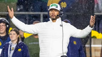 Notre Dame Fighting Irish head coach Marcus Freeman reacts