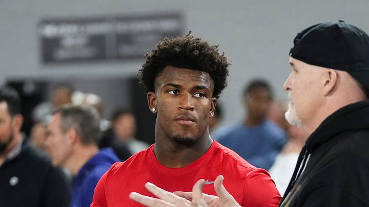 Ohio State Buckeyes safety Caleb Downs and Washington Commanders head coach Dan Quinn