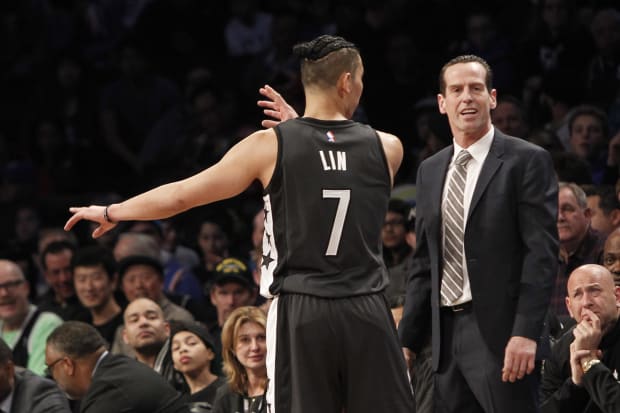 Mar 12, 2017; Brooklyn, NY, USA;  Brooklyn Nets guard Jeremy Lin (7) reacts with head coach Kenny Atkinson in the fourth quarter against New York Knicks at Barclays Center.  Nets win 120-112.  Mandatory Credit: Nicole Sweet-USA TODAY Sports